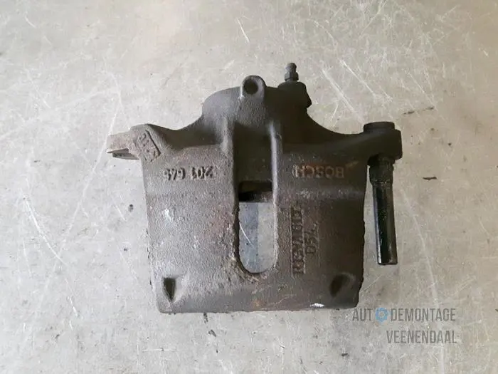 Front brake calliper, left Renault Kangoo