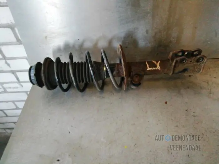 Fronts shock absorber, left Toyota Yaris
