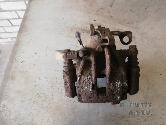 Rear brake calliper, left Volkswagen Sharan