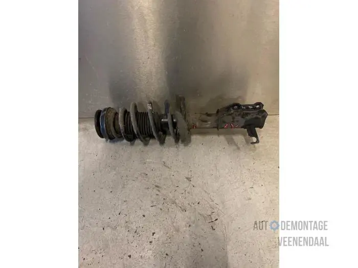 Fronts shock absorber, left Opel Insignia